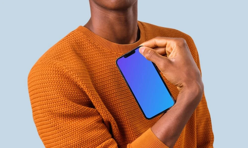 Man holding iPhone mockup
