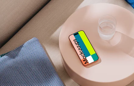 iPhone 17 Pro mockup on a pastel coffee table